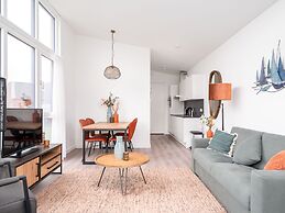 Bungalow With an Outdoor Fireplace by Water