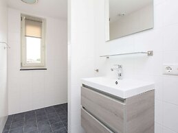 Bungalow With an Outdoor Fireplace by Water