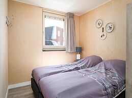 Bungalow With an Outdoor Fireplace by Water