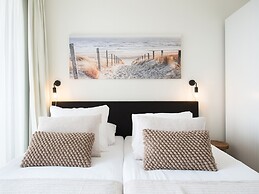 Modern Apartment With a View of the Scheveningen Harbor