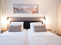 Modern Apartment With a View of the Scheveningen Harbor