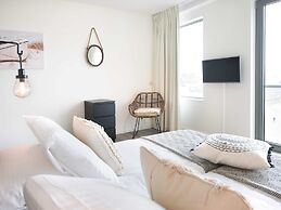 Modern Apartment With a View of the Scheveningen Harbor