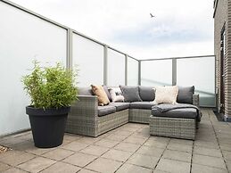 Modern Apartment With a View of the Scheveningen Harbor
