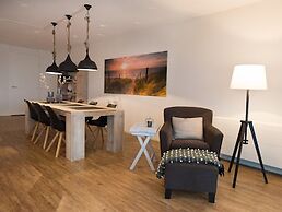 Modern Apartment With a View of the Scheveningen Harbor