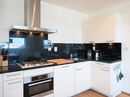 Modern Apartment With a View of the Scheveningen Harbor