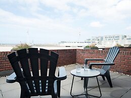 Modern Apartment With a View of the Scheveningen Harbor