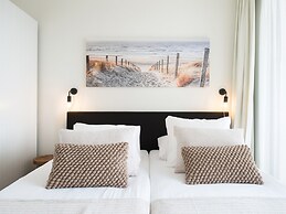 Modern Apartment With a View of the Scheveningen Harbor