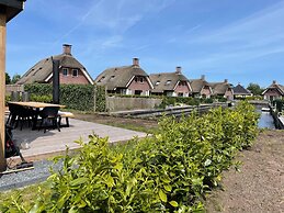 Atmospheric Villa With Nice Garden, in a Holiday Park at the Water in 