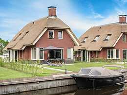 Atmospheric Villa With Nice Garden, in a Holiday Park at the Water in 