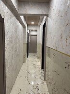 Hotel Newyork by Stayzy Rooms