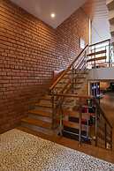 White Triangle By Joy Suites