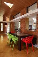 White Triangle By Joy Suites