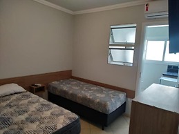 Kitnet com ar na praia das Astúrias