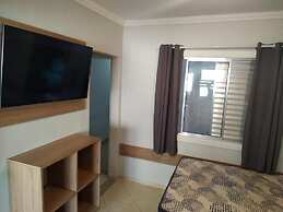 Kitnet com ar na praia das Astúrias