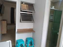 Kitnet com ar na praia das Astúrias