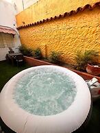 ESTUDIO CON JACUZZI BY PARCEROS GROUP