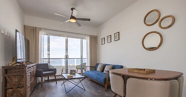 Condos Near Malecon Bay & Sunset Views