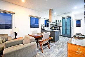 Condos Near Malecon Bay & Sunset Views