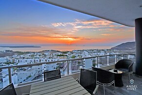 Condos Near Malecon Bay & Sunset Views