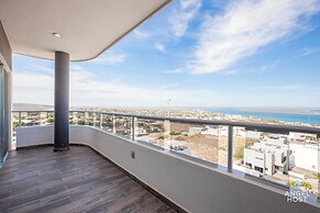 Condos Near Malecon Bay & Sunset Views