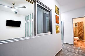 Condos Near Malecon Bay & Sunset Views