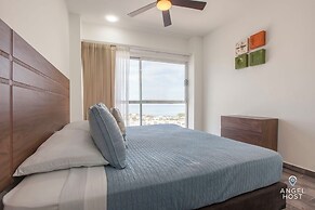 Condos Near Malecon Bay & Sunset Views