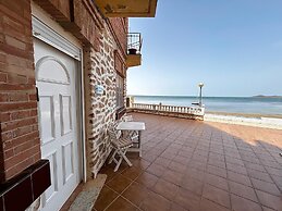 Beachfront Apartment With Patio & Private Terrace
