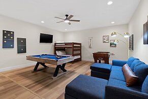 The Mad Hatter Heated Pool Gameroom