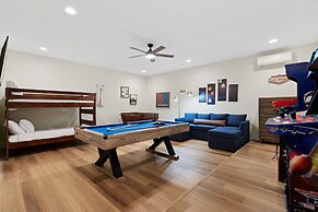 The Mad Hatter Heated Pool Gameroom