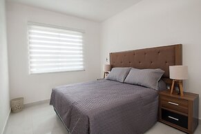 Cozy 2-Bedroom Retreat with Pool Access