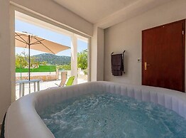 Beachfront Holiday Home With Hot Tub, Terrace, and Sea Views in Vinišć