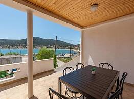 Beachfront Holiday Home With Hot Tub, Terrace, and Sea Views in Vinišć