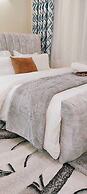 Lux Suites Capital Heights Apartments