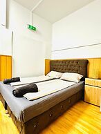 10 Economy Rooms-Shared Bath & Kitchen