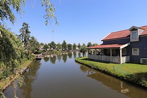 House on the Water With Fishing Platform
