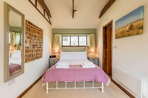 Host Stay Woodfalls Barn