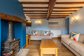 Host Stay Honeysuckle Cottage