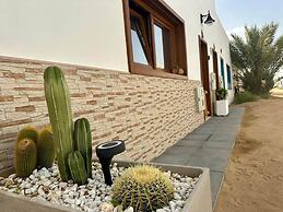 Bayside La Graciosita Traditional Home