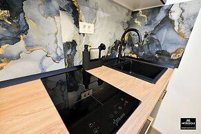 Metropole Apartments Central City