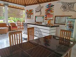 Ratu Cottage by OurStory Travels