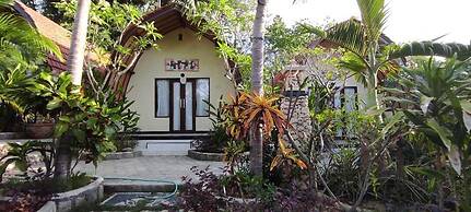 Ratu Cottage by OurStory Travels