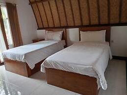 Ratu Cottage by OurStory Travels