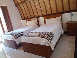 Ratu Cottage by OurStory Travels