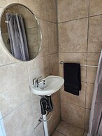 Room in B&B - Khutsong Apartmentss