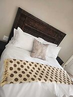 Room in B&B - Khutsong Apartmentss