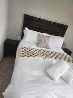 Room in B&B - Khutsong Apartmentss