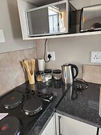 Room in B&B - Khutsong Apartmentss