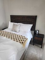 Room in B&B - Khutsong Apartmentss