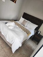 Room in B&B - Khutsong Apartmentss