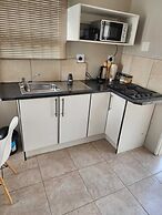 Room in B&B - Khutsong Apartmentss